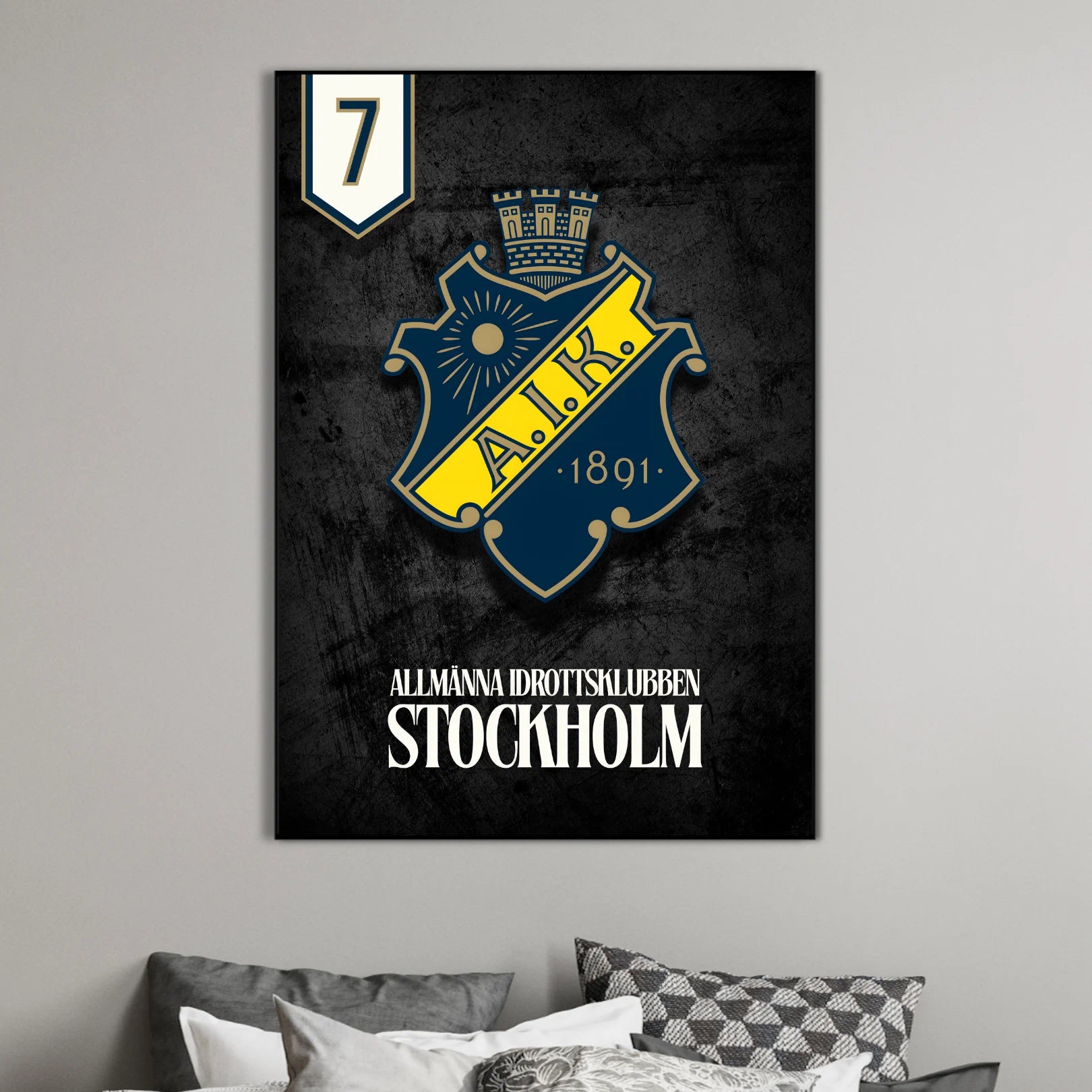 aik poster in bedroom against a grey wall