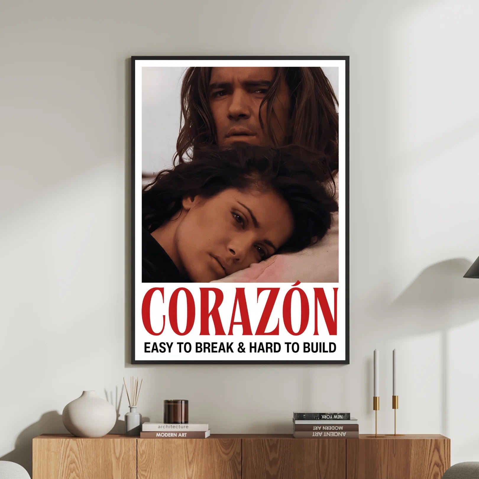 Framed desperado movie poster of Antonio Banderas and Selma Hayek with 'Corazon' text in a living room setting.