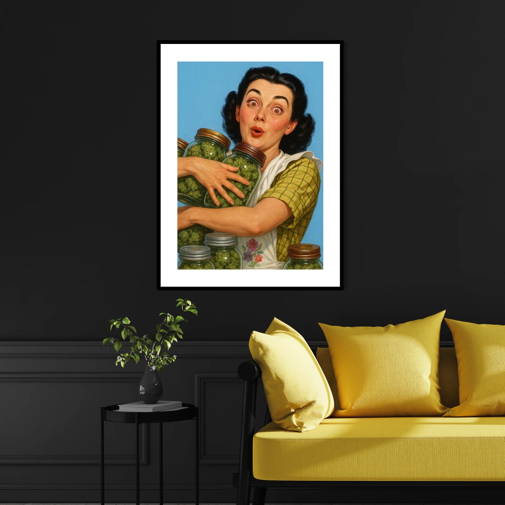 Framed artwork of a woman holding jars of cannabis on a black wall above a yellow sofa.