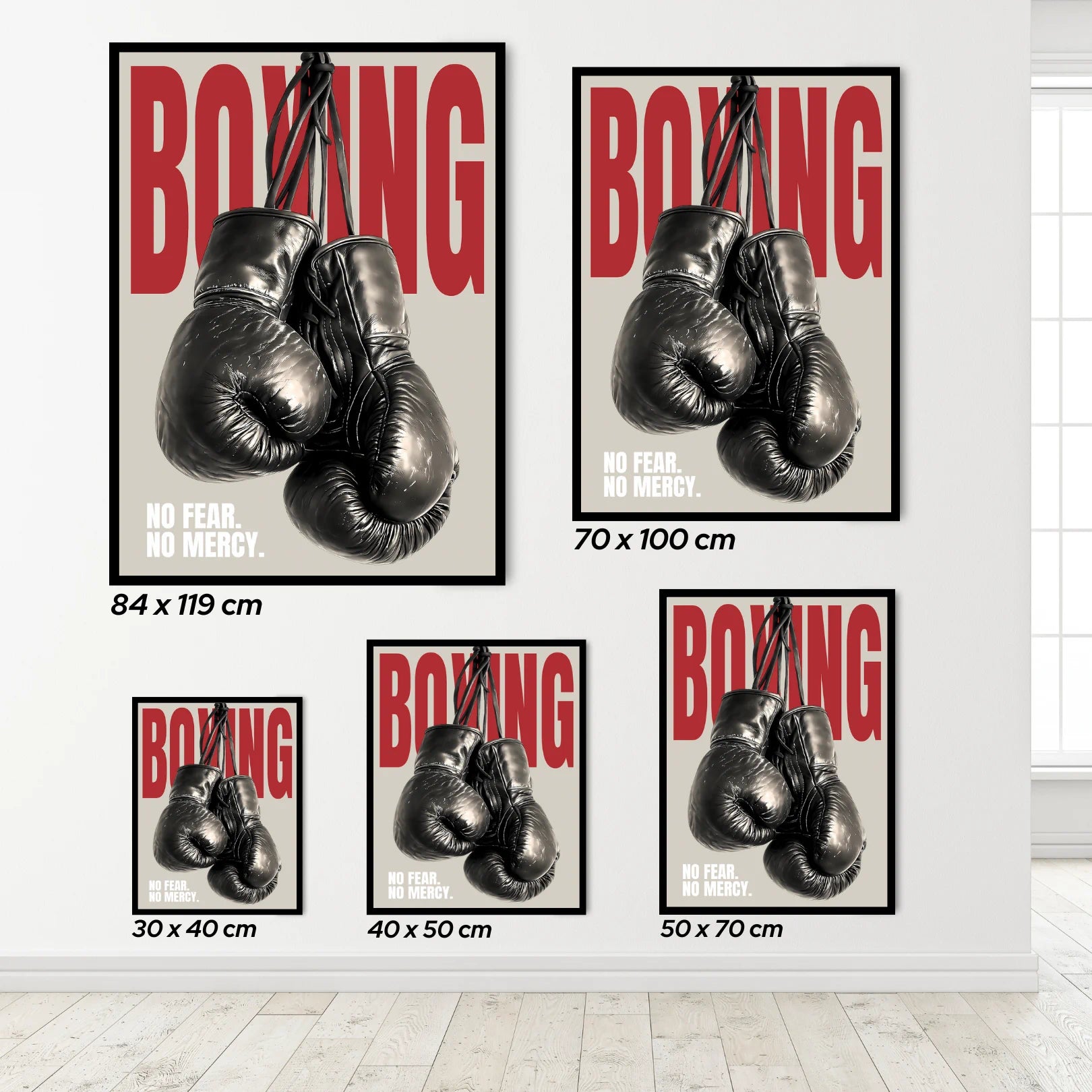 Set of boxing posters with gloves and text on a white wall.