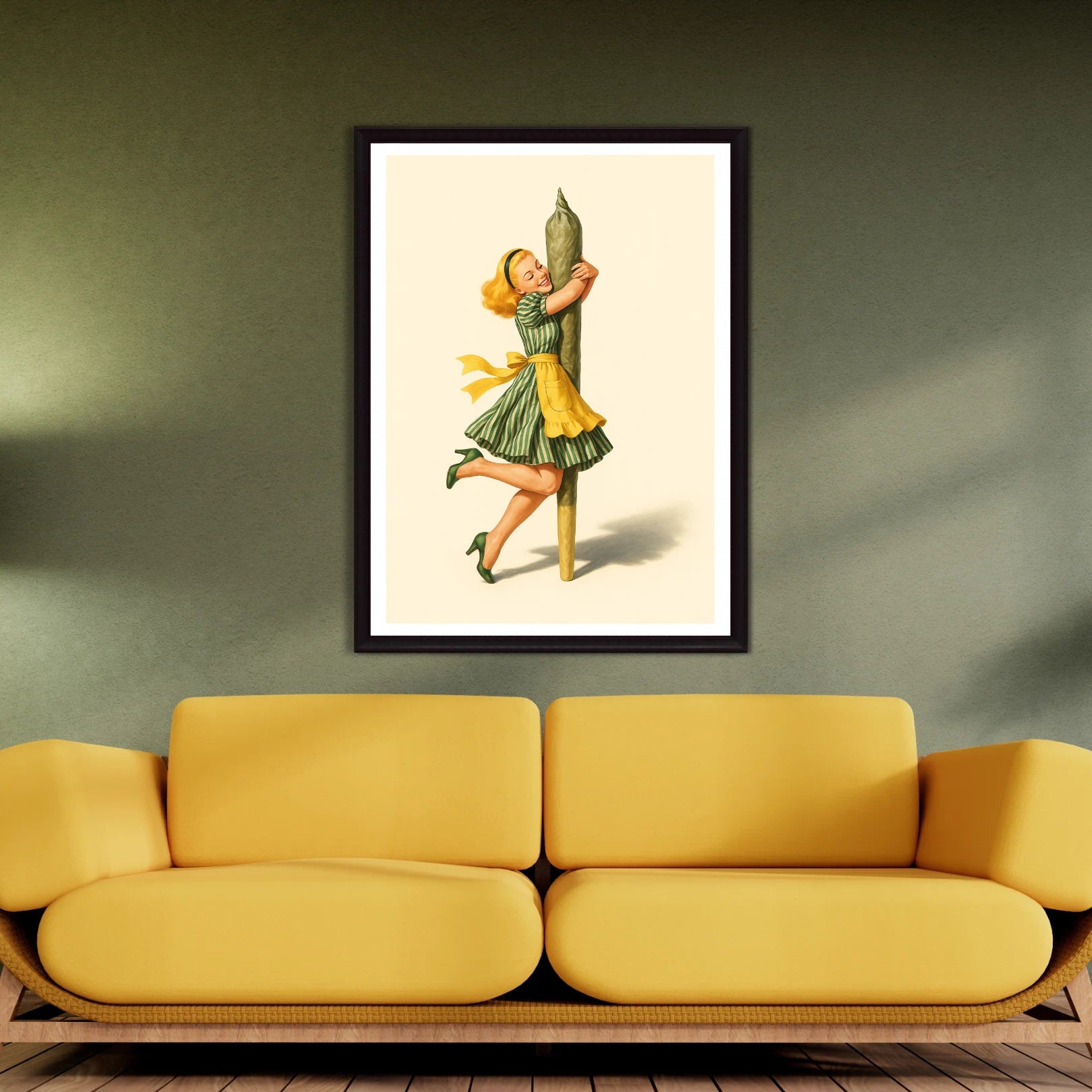 Framed artwork of a woman holding a cannabis joint on a wall above a yellow sofa.