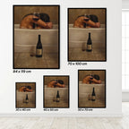 Set of framed artworks showing a person in a bathtub with a wine bottle and glass, displayed in various sizes.