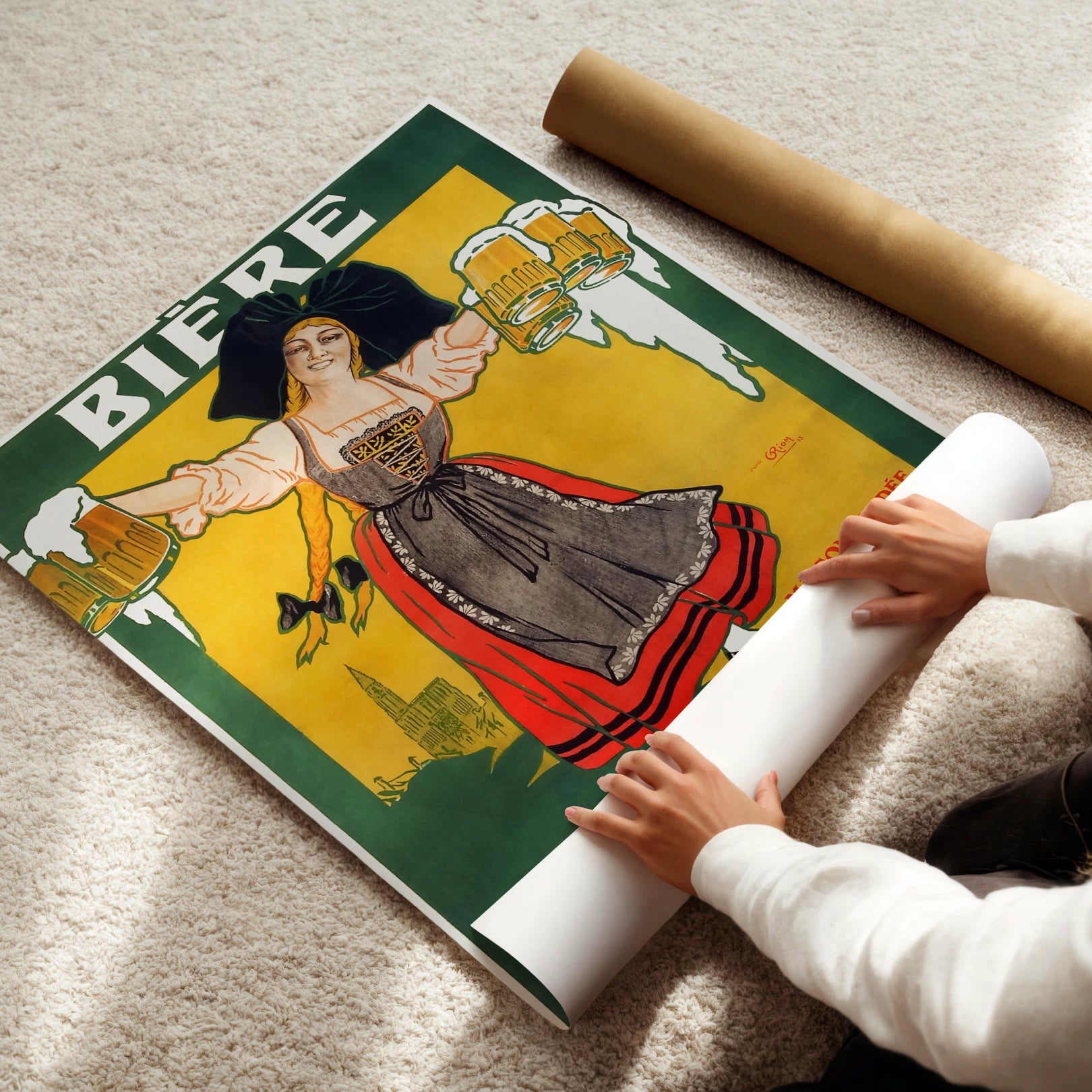Person unrolling a vintage-style beer poster with a colorful design of a woman and beer bottles.