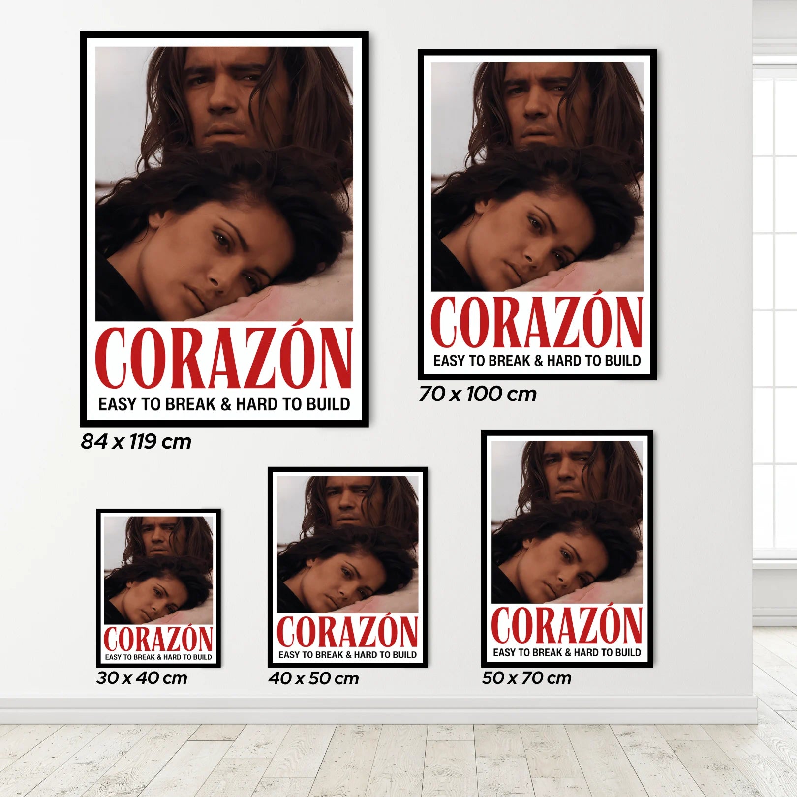 Set of desperado movie posters with different sizes displayed on a wall.