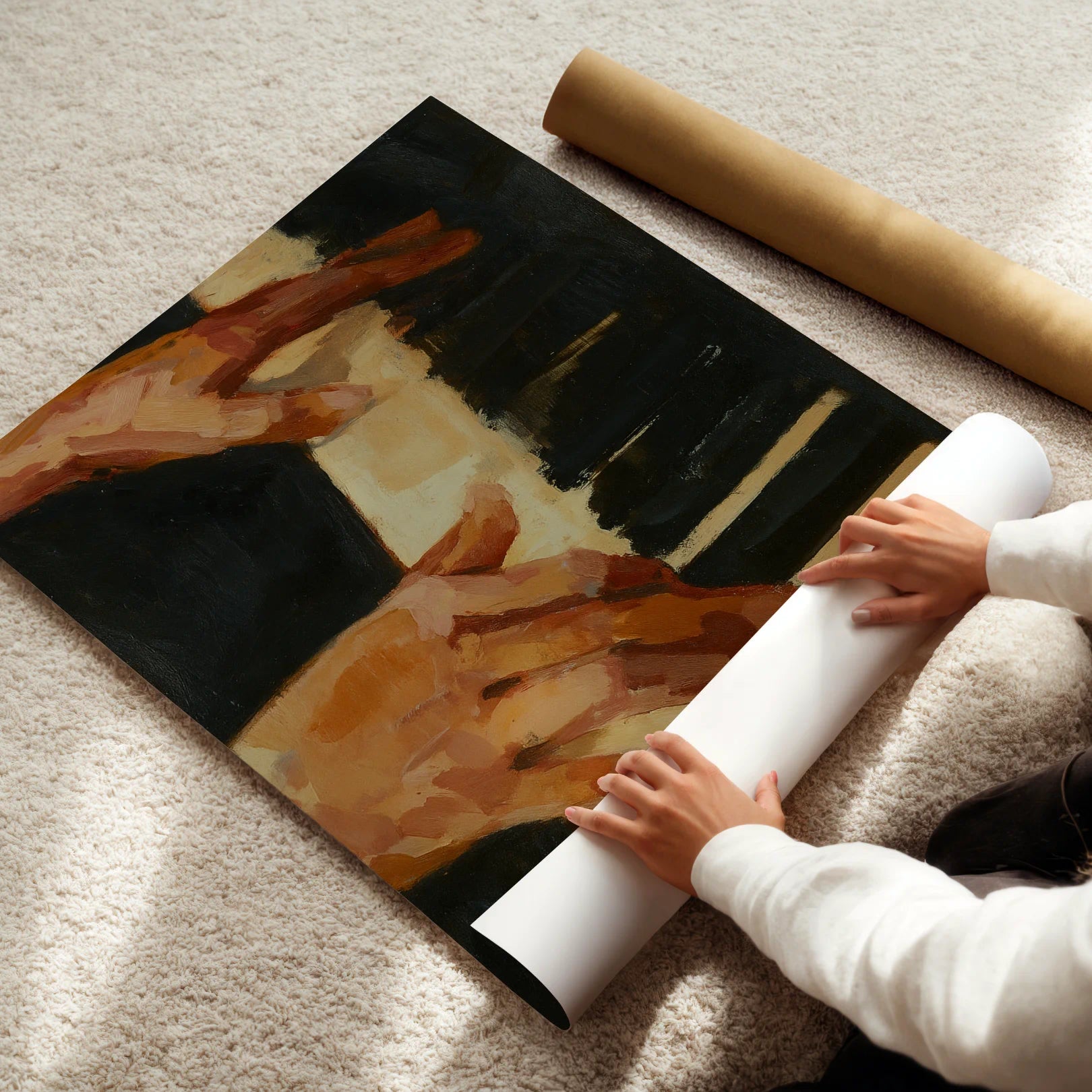 Person unrolling a large poster of hands on a piano keyboard.