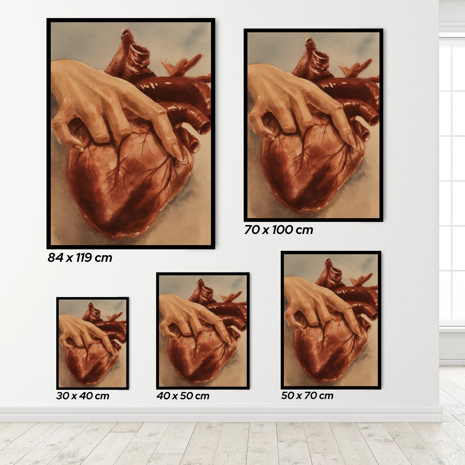 Set of framed artworks depicting a heart with fingers penetrating the heart on a white wall.