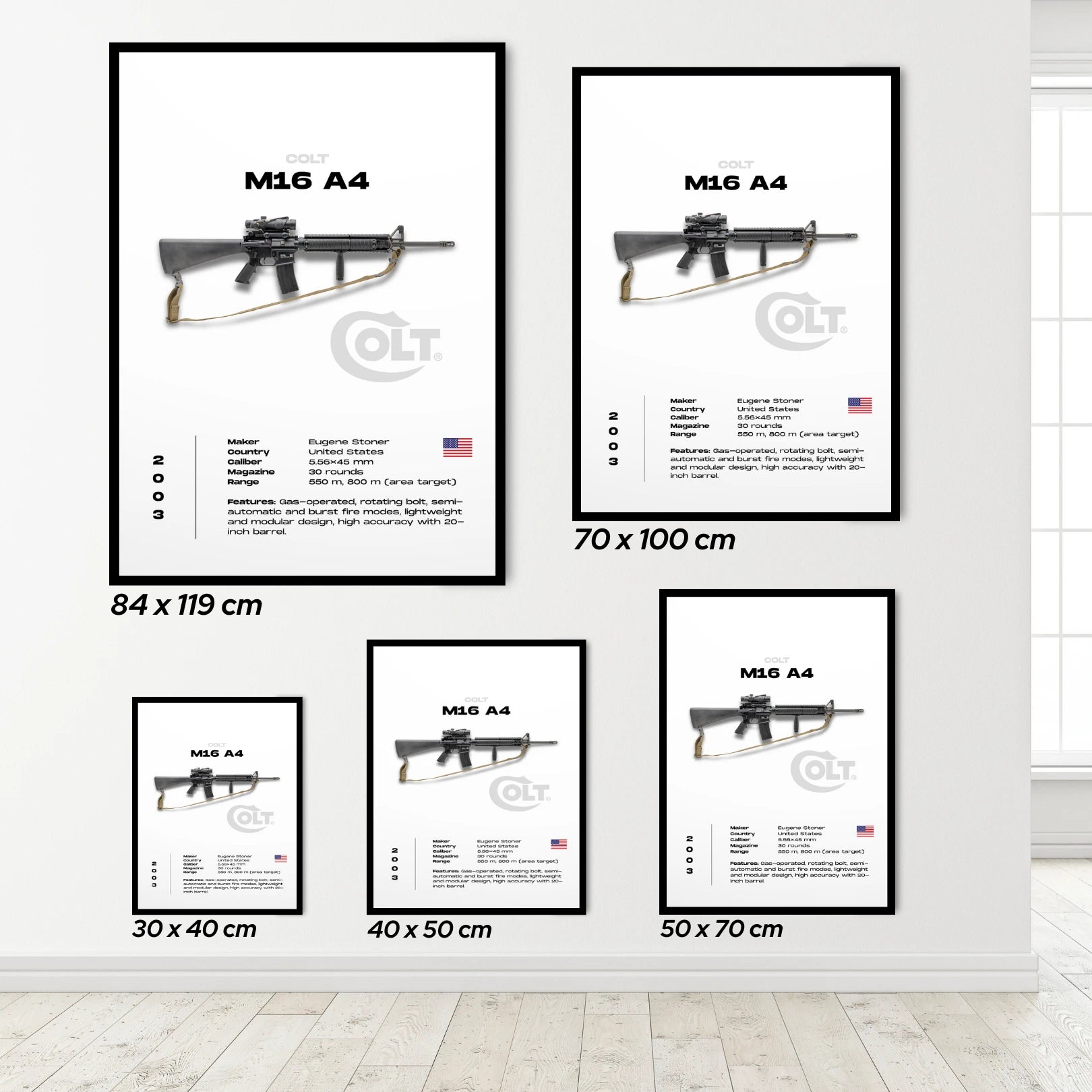 Set of framed prints featuring the M16 A4 rifle with COLT branding on a white wall.
