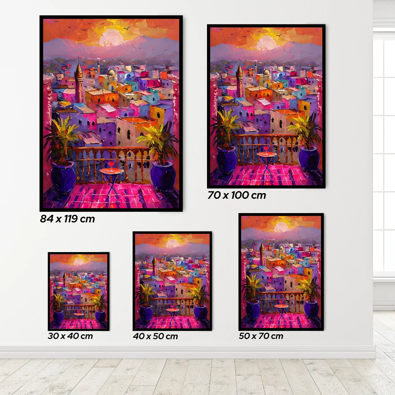 Set of colorful cityscape in Morocco paintings with dimensions displayed on a white wall.
