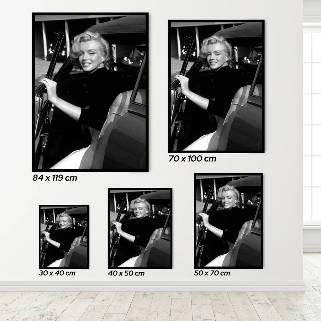 Set of framed black and white posters of Marilyn Monroe in a car, displayed with dimensions.