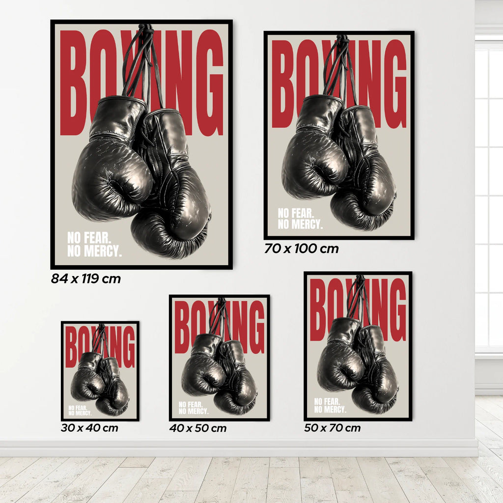 Set of boxing posters with gloves and text on a white wall.