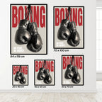 Set of boxing posters with gloves and text on a white wall.