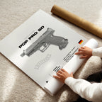 Person unrolling a poster of a gun model with 'Walther' branding on a light-colored floor.